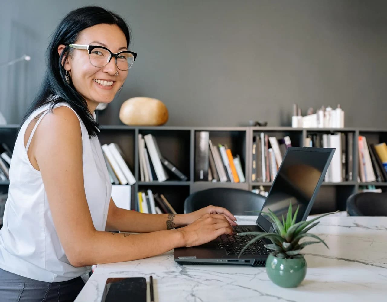 A person completing an online form